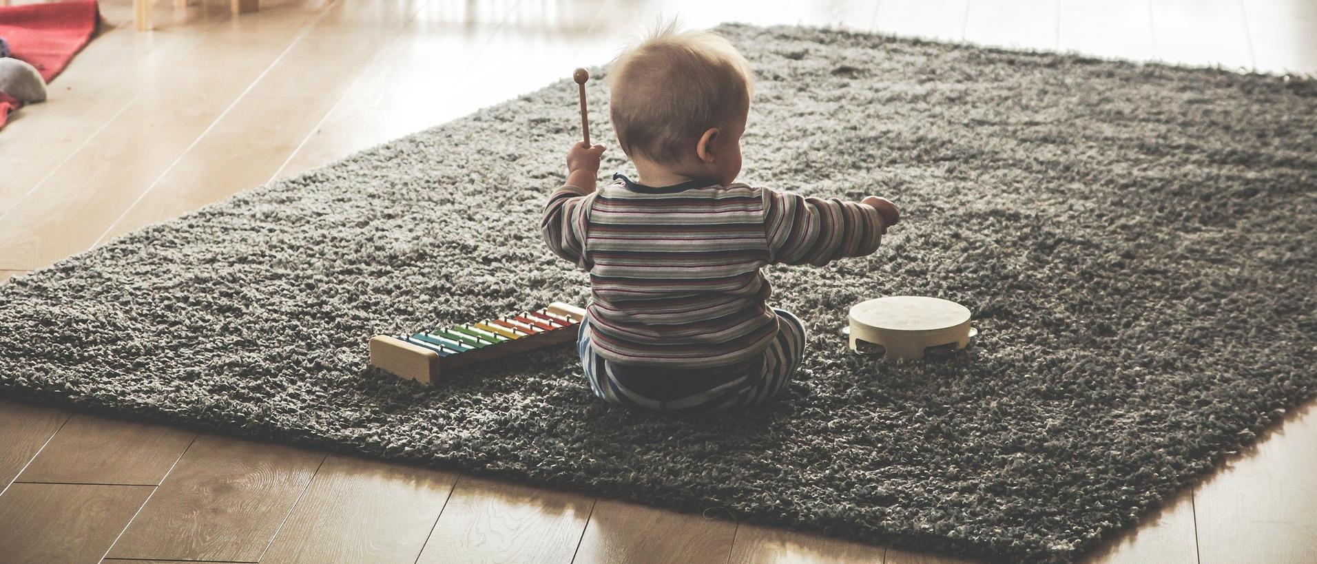 Photo of baby with drum